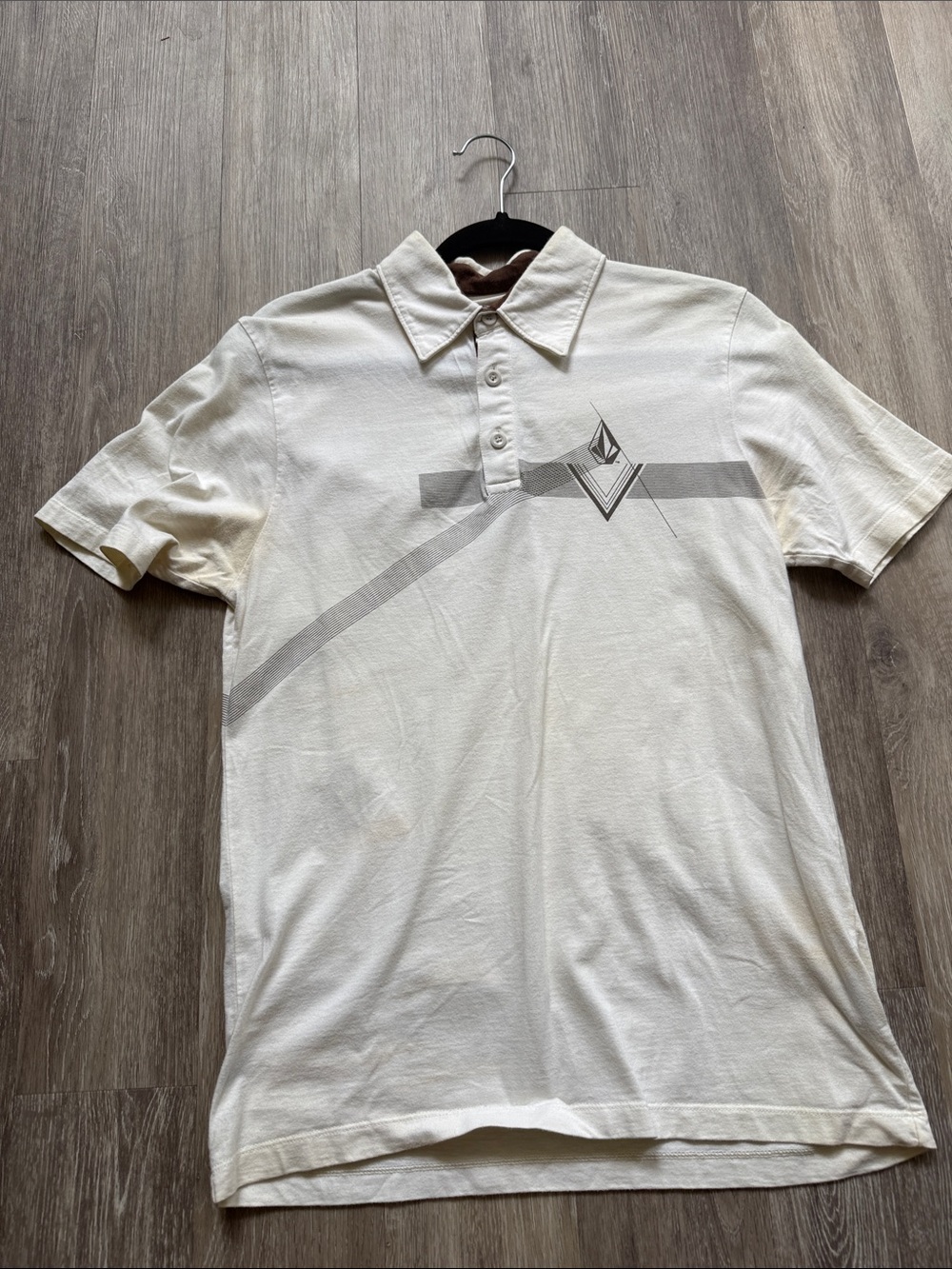 Vintage Volcom Men's Cream Polo w/brown Graphic slightly discolored from usage